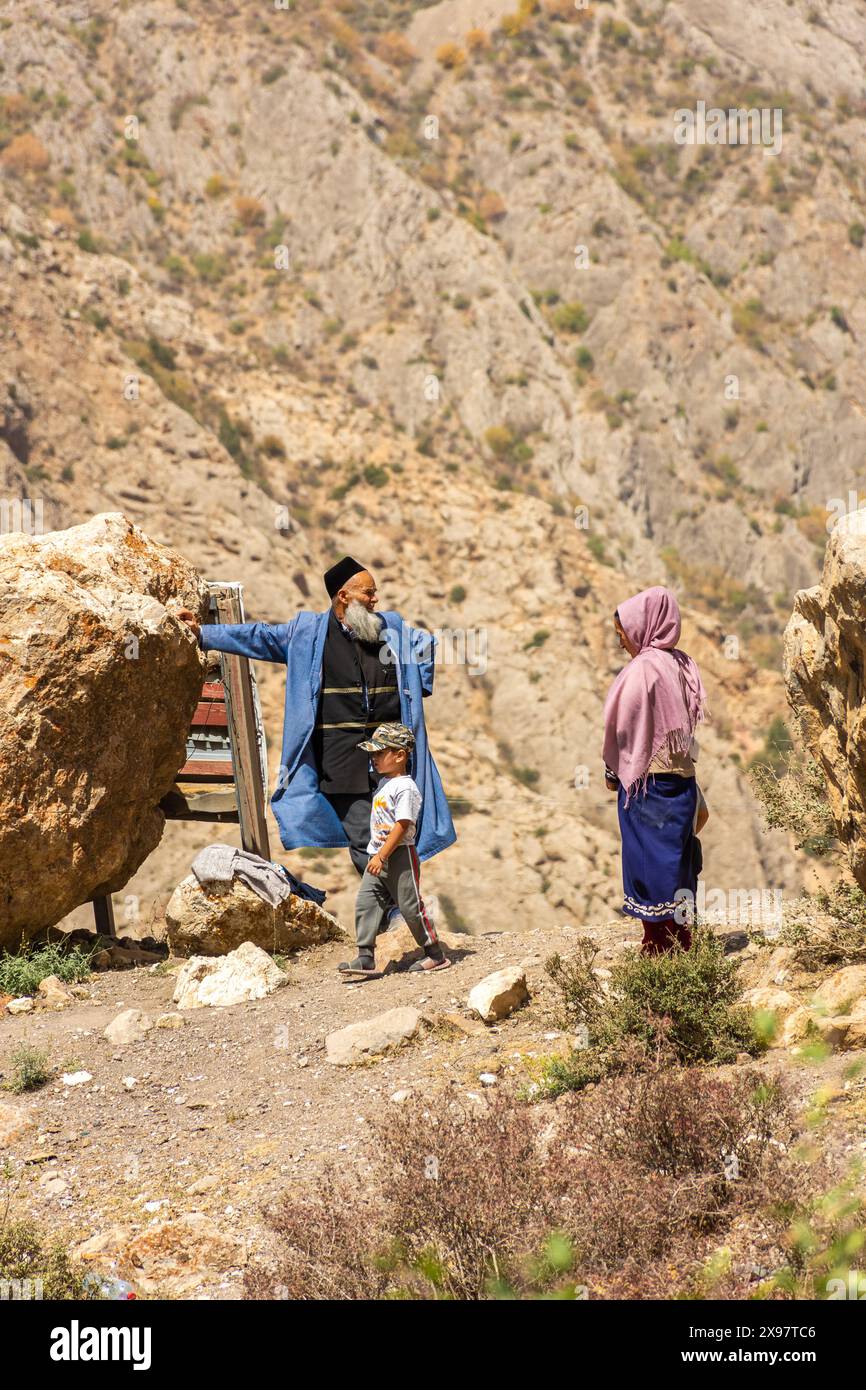 haft-kul-tajikistan-21-august-2023-local-imam-walking-in-the-fan