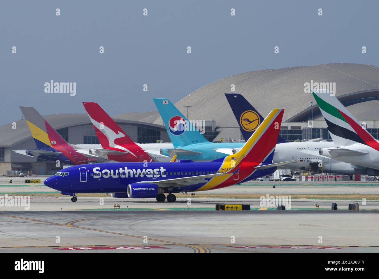 Southwest Airlines Boeing 737 shown taxiing by Terminal B, LAX, Los Angeles International