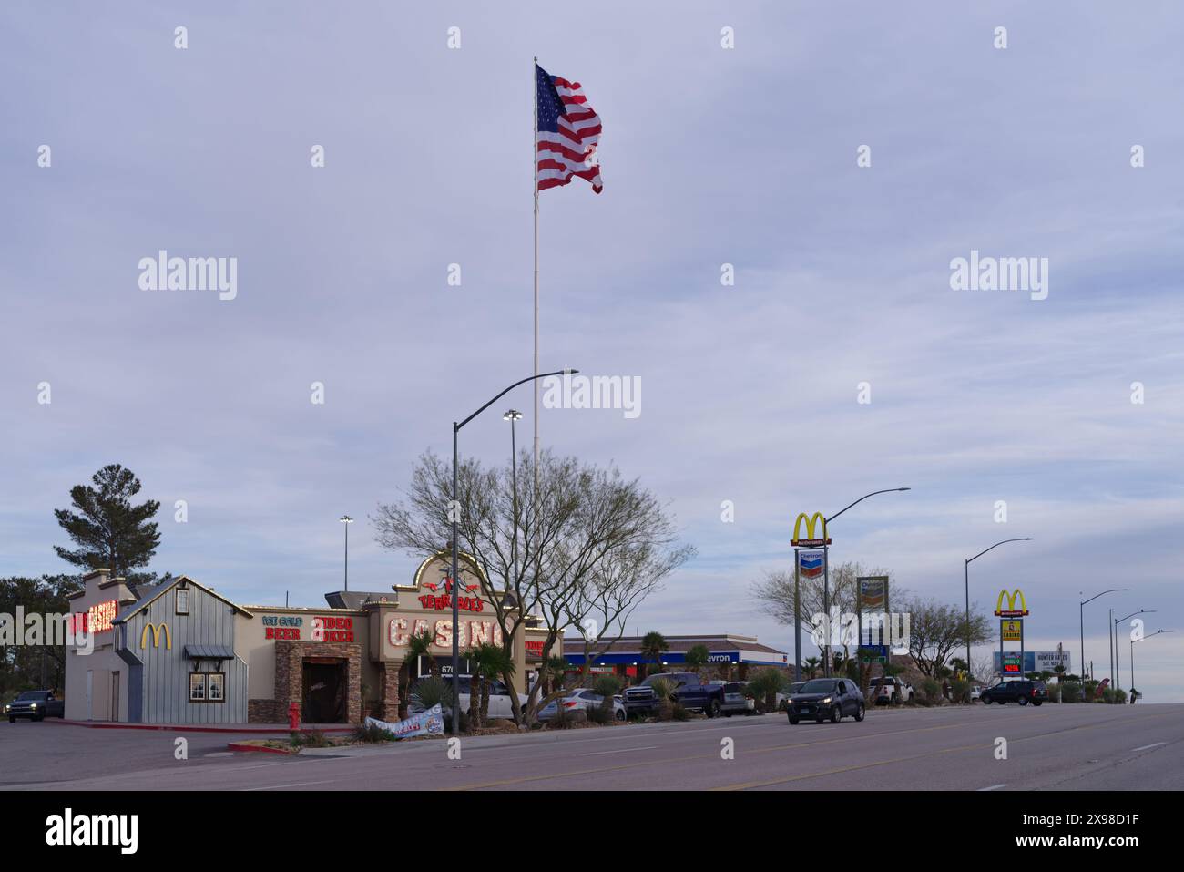 Casino, gas station, and fast-food restaurant signs shown in the town of Searchlight, Nevada, on March 4, 2024. Stock Photo