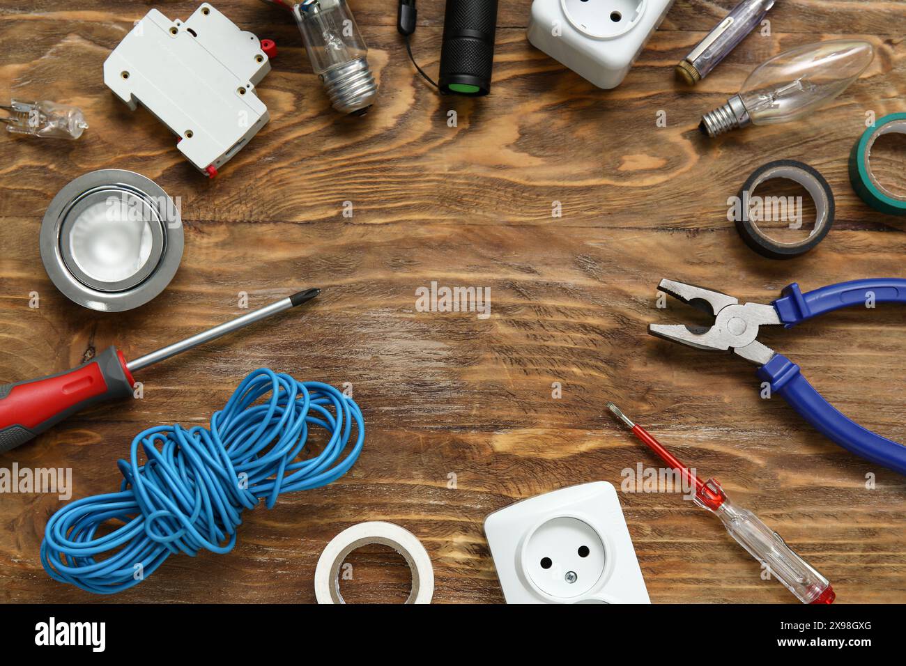 Frame made from electrician's tools on wooden background Stock Photo ...