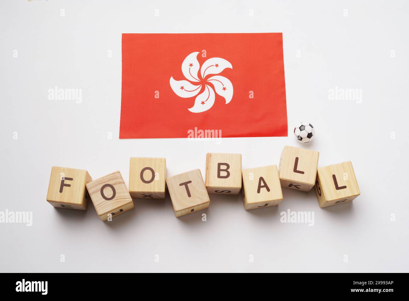 Hong Kong flag with football title and white background. football concept Stock Photo