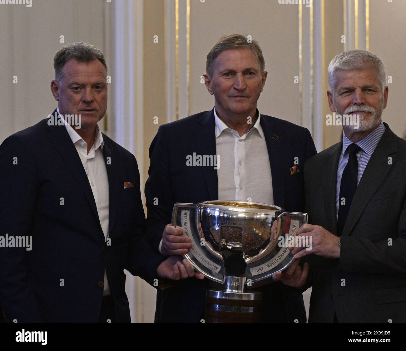 Prague, Czech Republic. 30th May, 2024. Czech President Petr Pavel meets Czech ice hockey team that won world championship in Prague Castle, Czech Republic, May 30, 2024. From left Radim Rulik head coach, Alois Hadamczik, president of Czech Ice Hockey Association, Czech President Petr Pavel. Credit: Michal Krumphanzl/CTK Photo/Alamy Live News Stock Photo