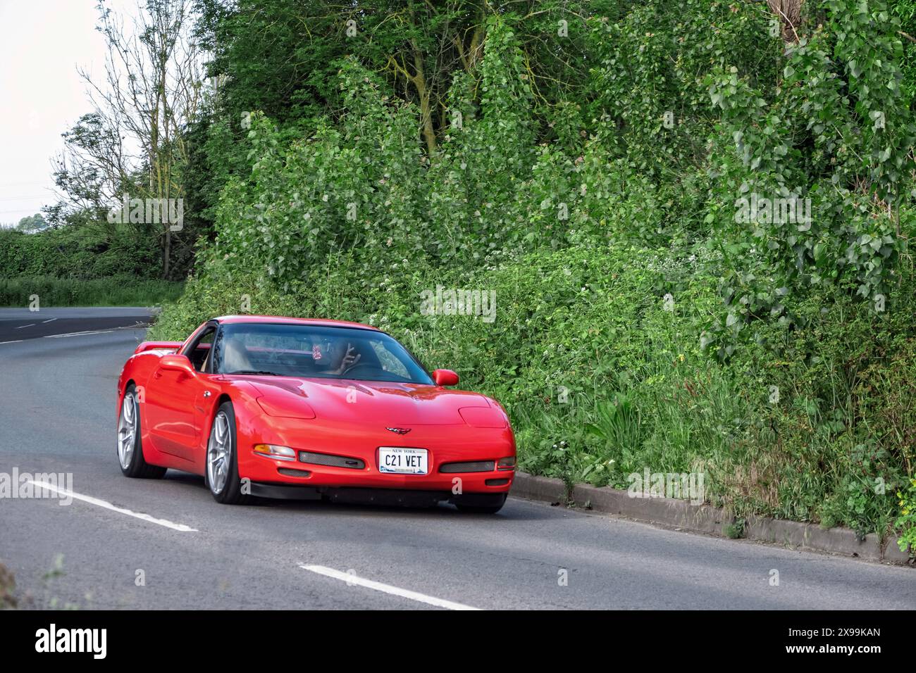 2020 Chevrolet Corvette C21 driving on a country road Stock Photo