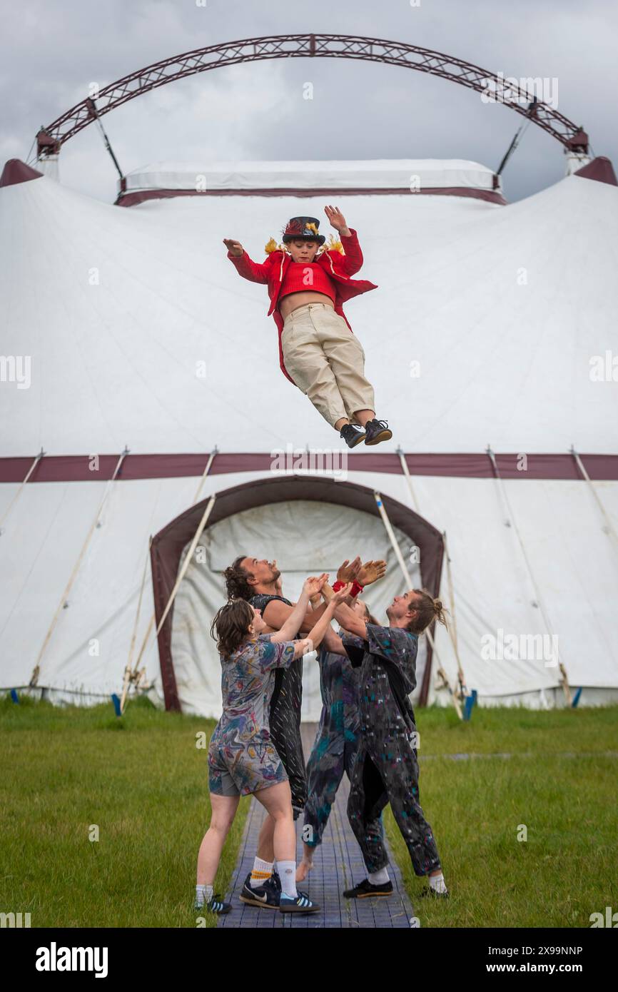 High Risk Acrobats London, UK. 30 May 2024. Acrobats perform outside the big top at a ...