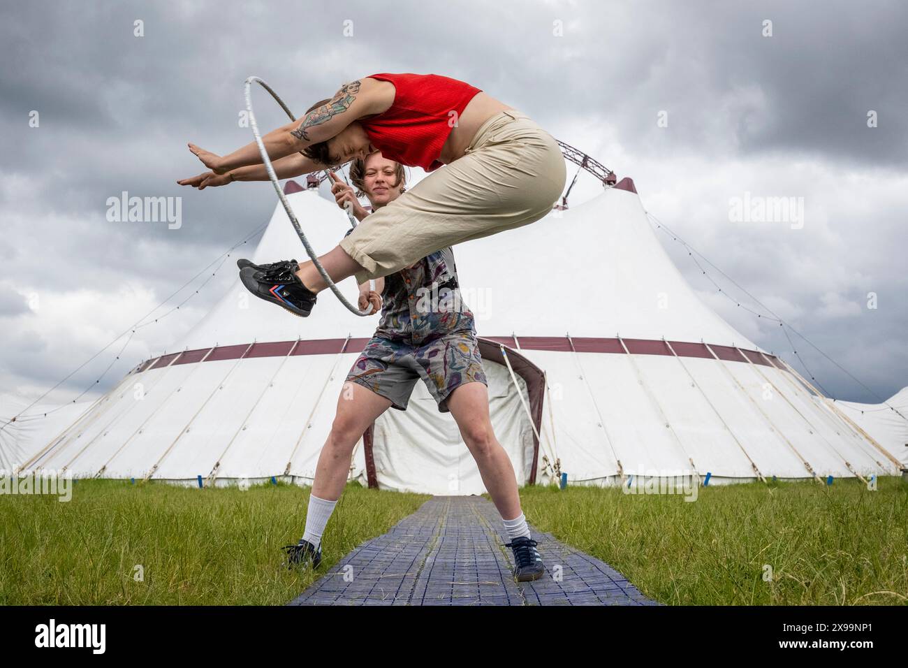 High Risk Acrobats London, UK. 30 May 2024. Acrobats perform outside the big top at a ...