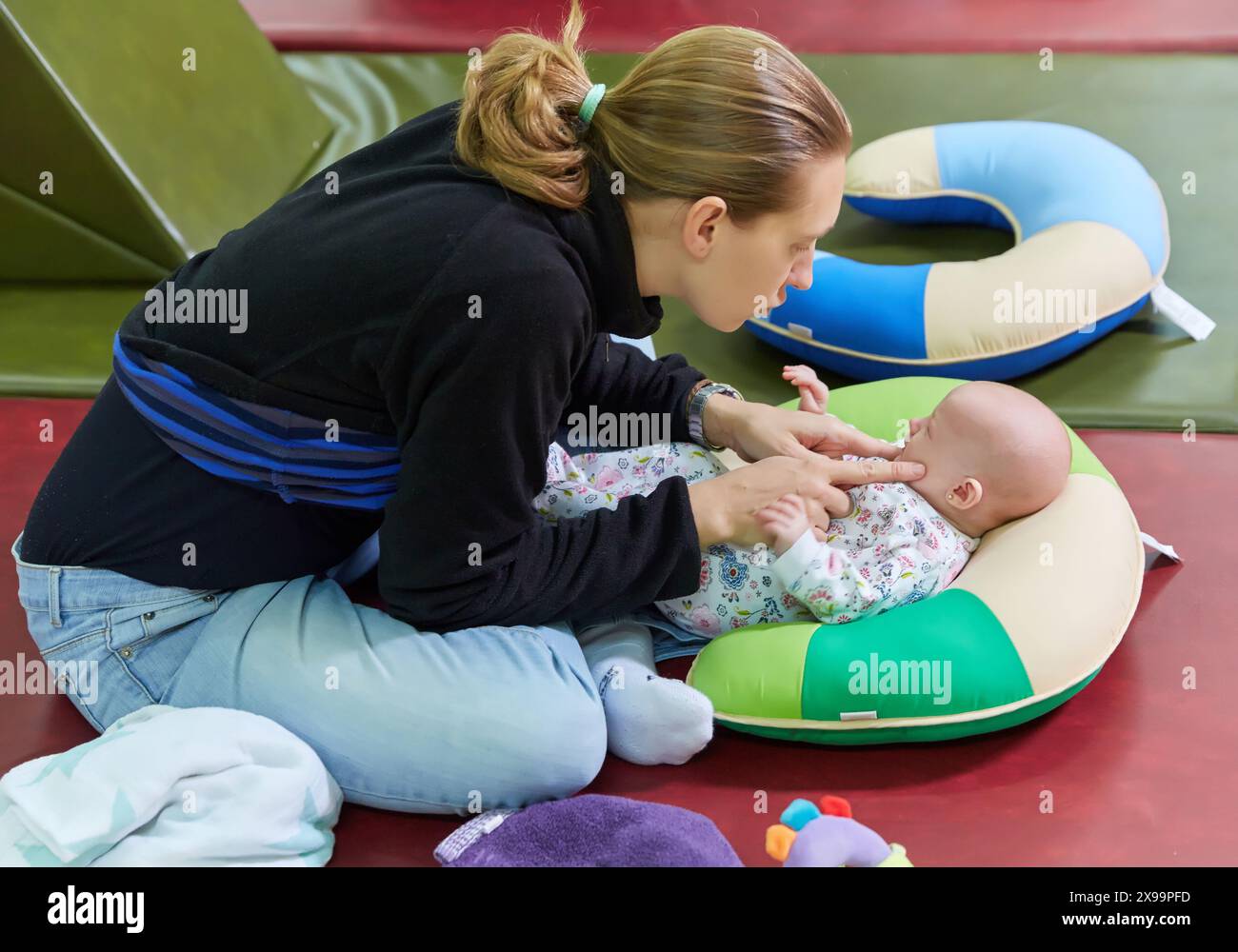 Basque Mother Mother breastfeeding newborn baby sitting hi-res stock photography and ...