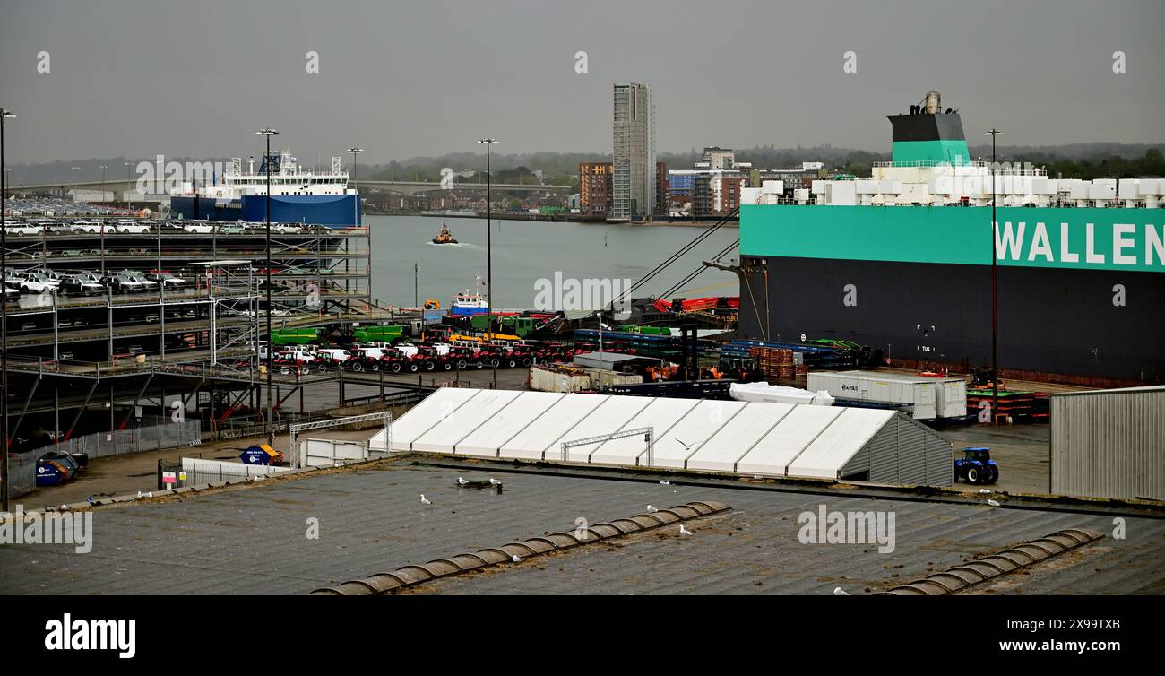 Vehicles awaiting export at the port of Southampton. On the right is