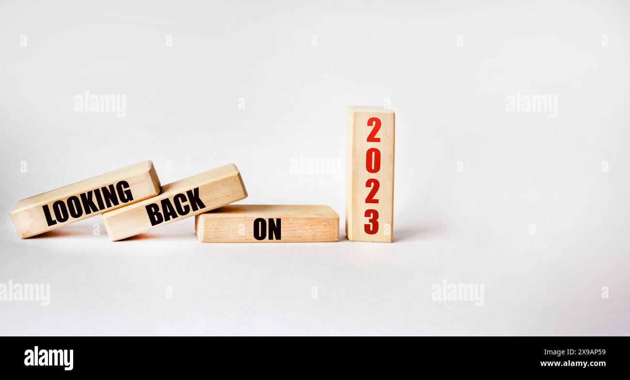 Text Looking back to 2023 on wooden blocks and white background Stock Photo