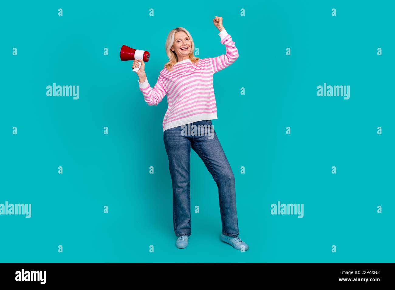 Mature woman fist up isolated hi-res stock photography and images - Alamy