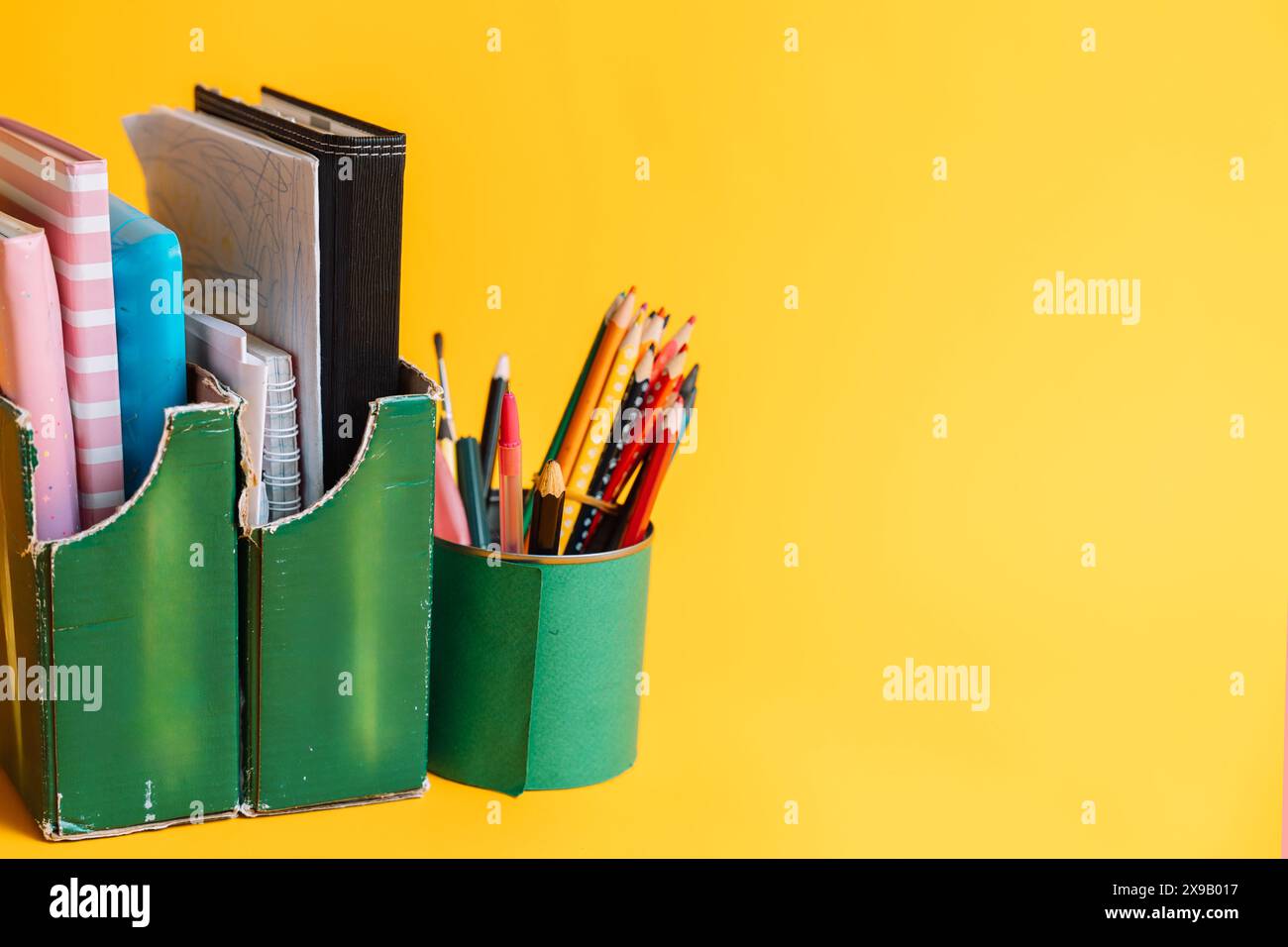 Recycle cans and boxes for notebook and pencil containers Stock Photo ...