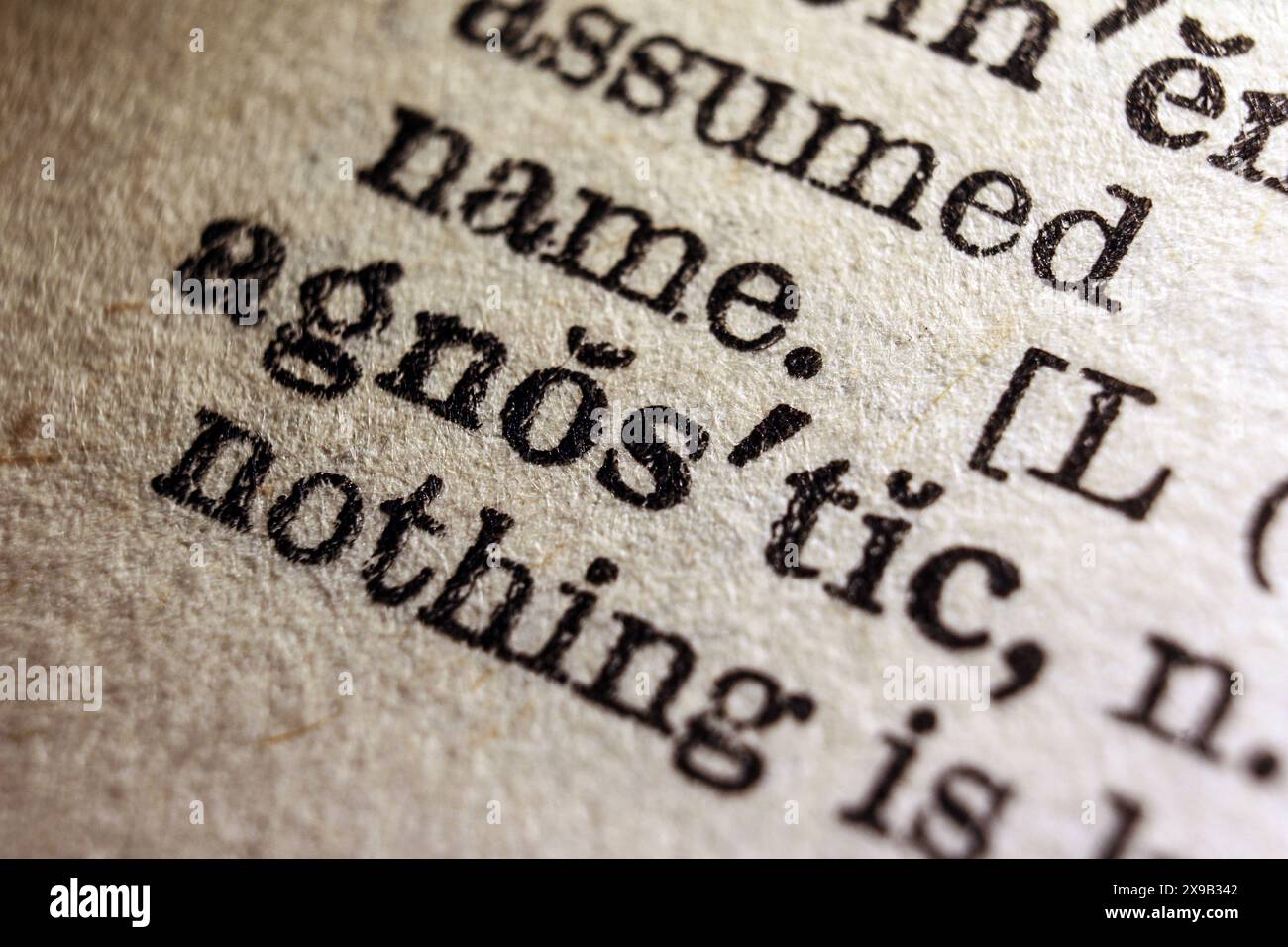 Word agnostic on dictionary page, macro close-up Stock Photo