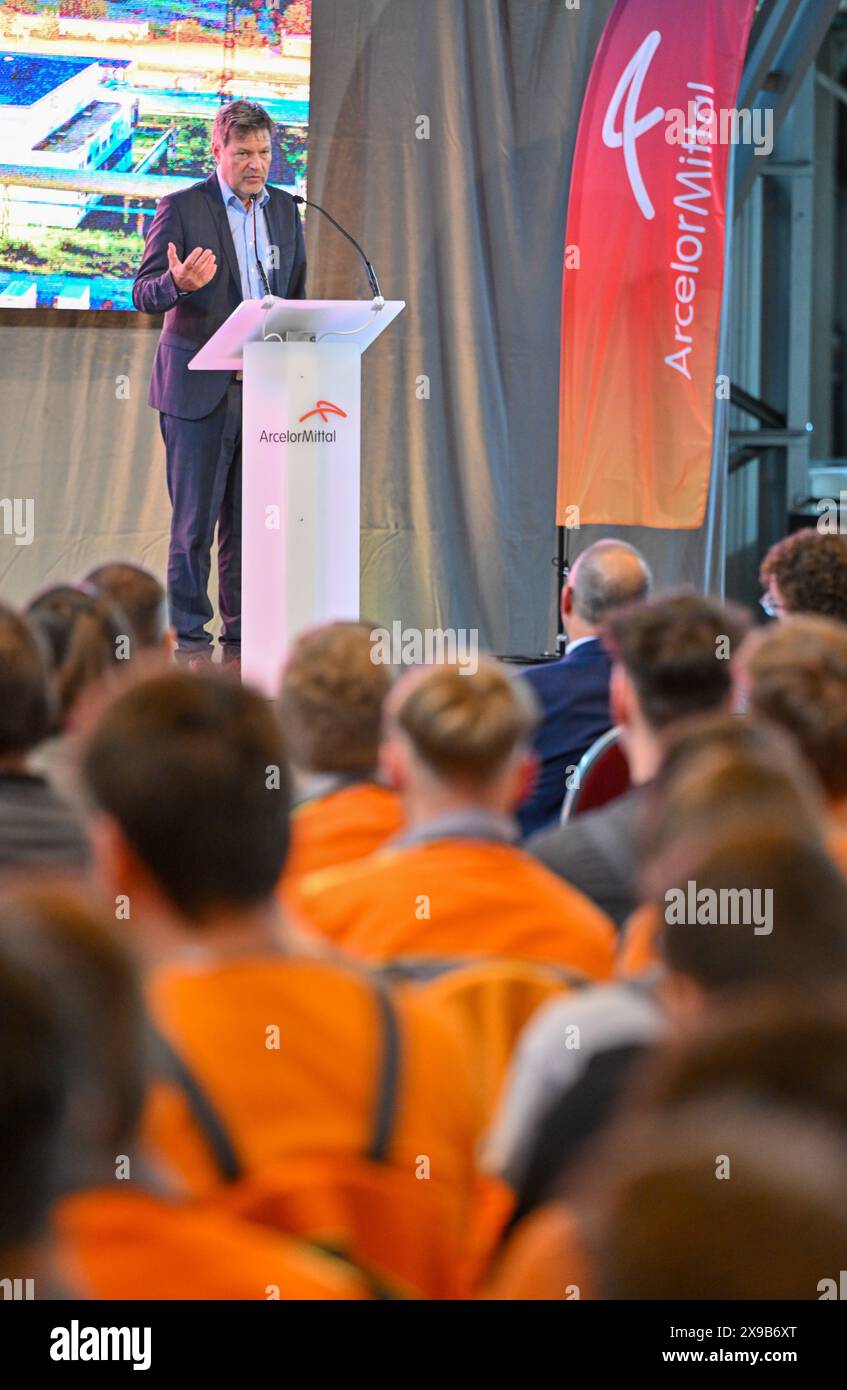 30 May 2024, Brandenburg, Eisenhüttenstadt: Robert Habeck (Greens), Federal Minister of Economics, speaks at the handover of a funding decision for almost 1.3 billion euros for the climate-neutral steel production of steel producer ArcelorMittal. The joint decarbonization project of the Eisenhüttenstadt and Bremen sites is of outstanding importance for the future of ArcelorMittal's two flat steel plants in Germany. Photo: Patrick Pleul/dpa Stock Photo