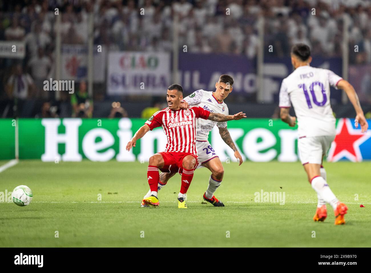 Athens, Greece. 29th May, 2024. Chiquinho (6) of Olympiacos and Lucas Martinez Quarta (28) of Fiorentina seen during the UEFA Conference League final between Olympiacos and Fiorentina at OPAP Arena in Athens. Credit: Gonzales Photo/Alamy Live News Stock Photo
