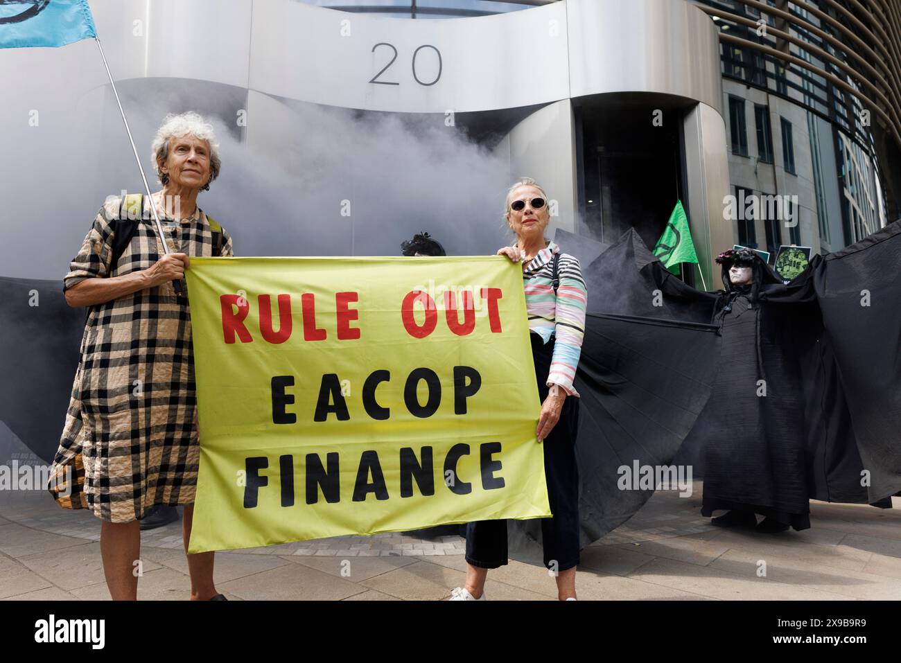 12th June 2023, City of London, UK. Extinction Rebellion 'Oil Slickers' protest against The East African crude oil pipeline (EACOP) at offices of Standard Bank. Stock Photo