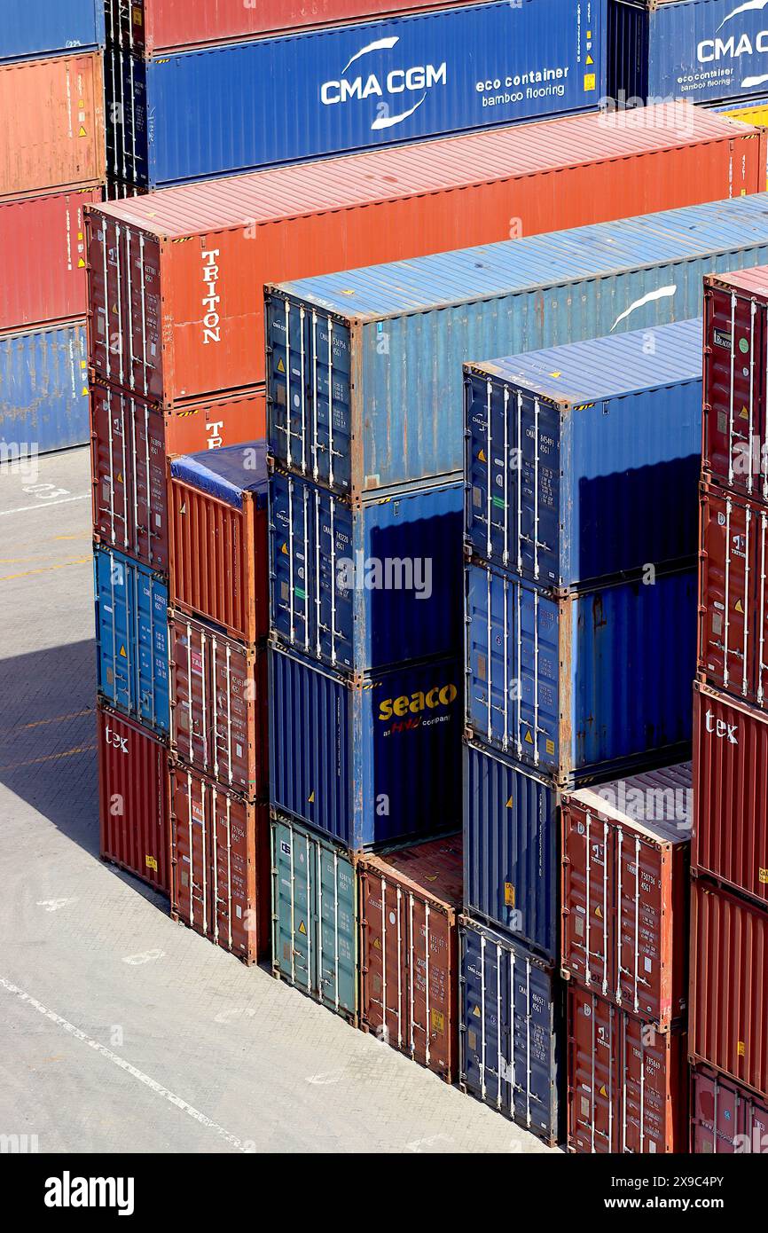 Shipping containers showing security locking bars and locking cams on