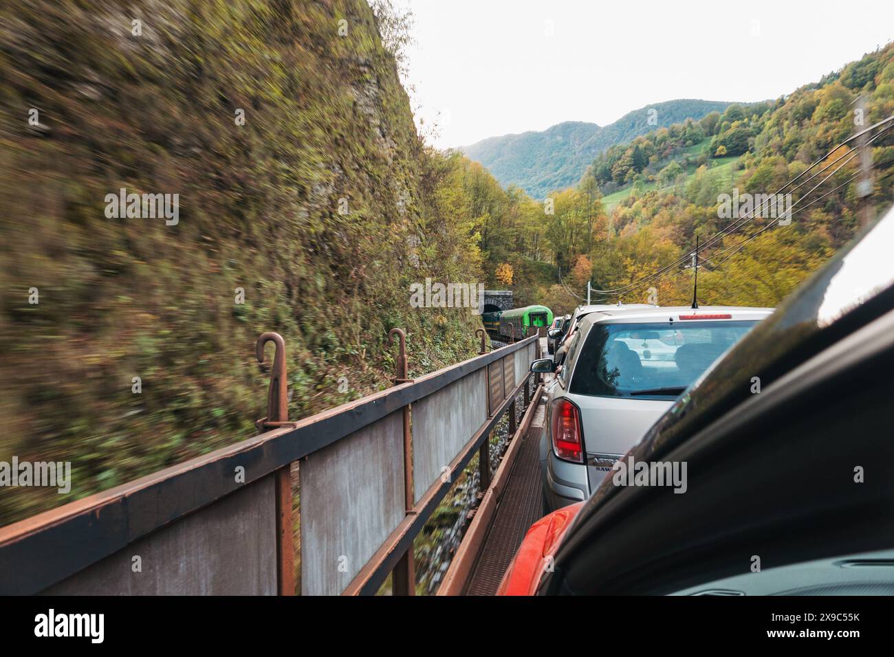 cars on the back of a motorail train in Slovenia Stock Photo - Alamy