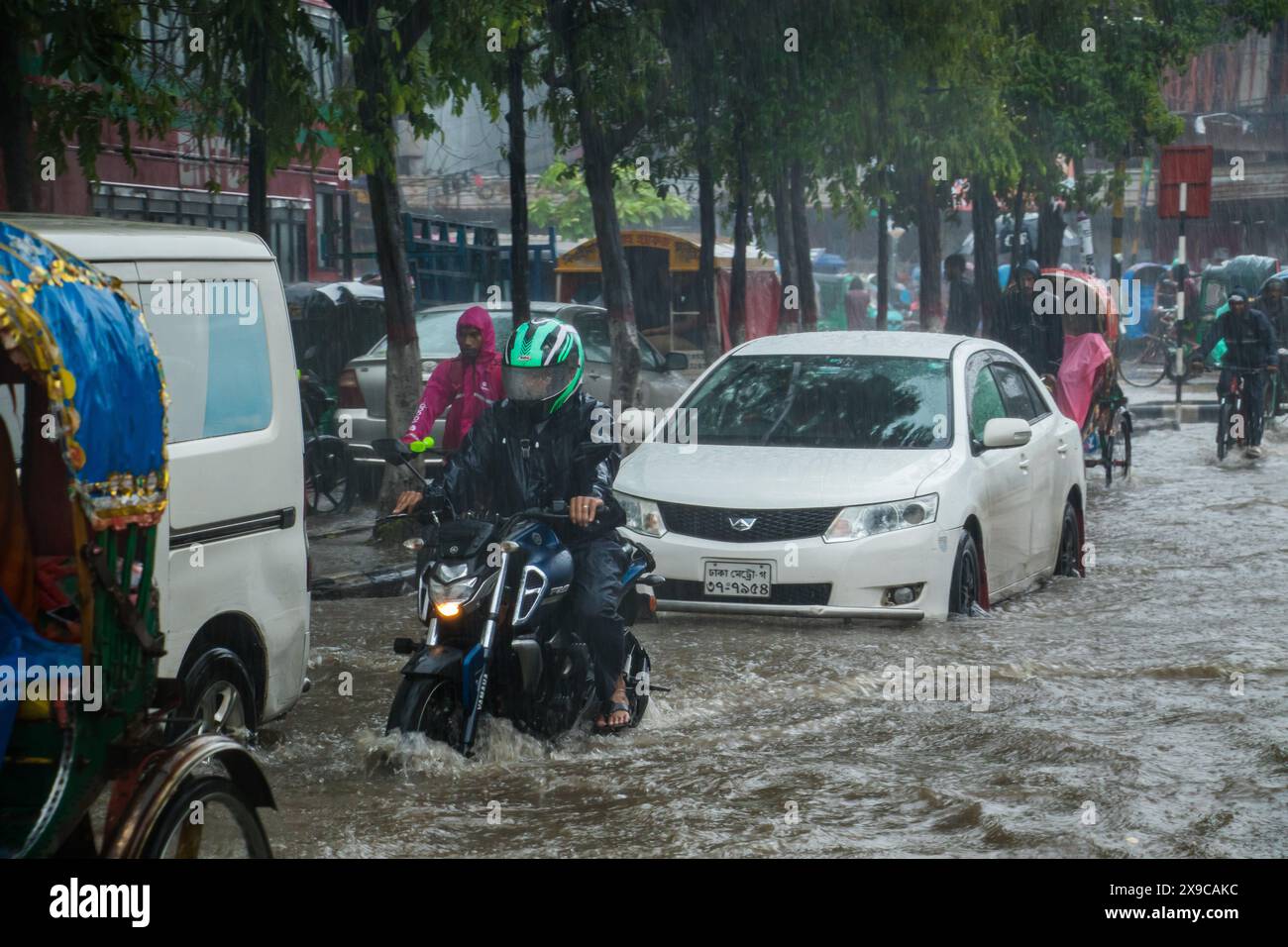 Cyclone Remal caused heavy rainfall, flooding, and strong winds in Dhaka City, leading to disrupted transport, power outages, and significant property Stock Photo