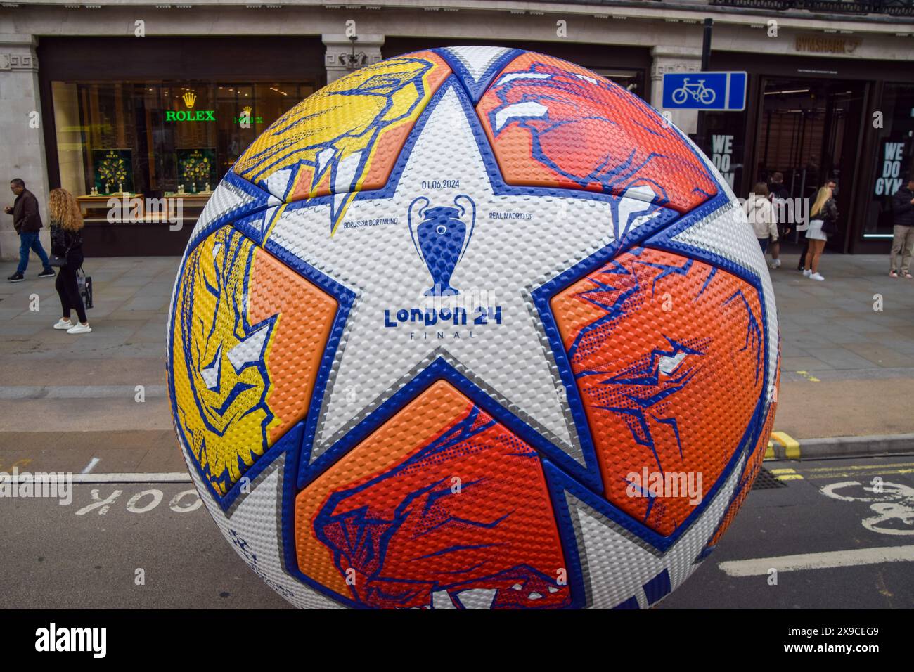 London, UK. 30th May 2024. A giant football is displayed as the Champions League Festival takes over Regent Street ahead of the final. Borussia Dortmund will face off with Real Madrid at Wembley Stadium on 1st June. Credit: Vuk Valcic/Alamy Live News Stock Photo