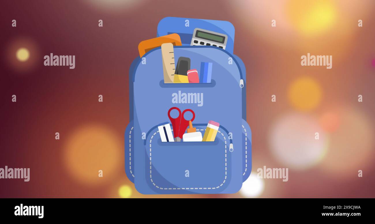 A blue backpack filled with school supplies like ruler, calculator, and scissors Stock Photo