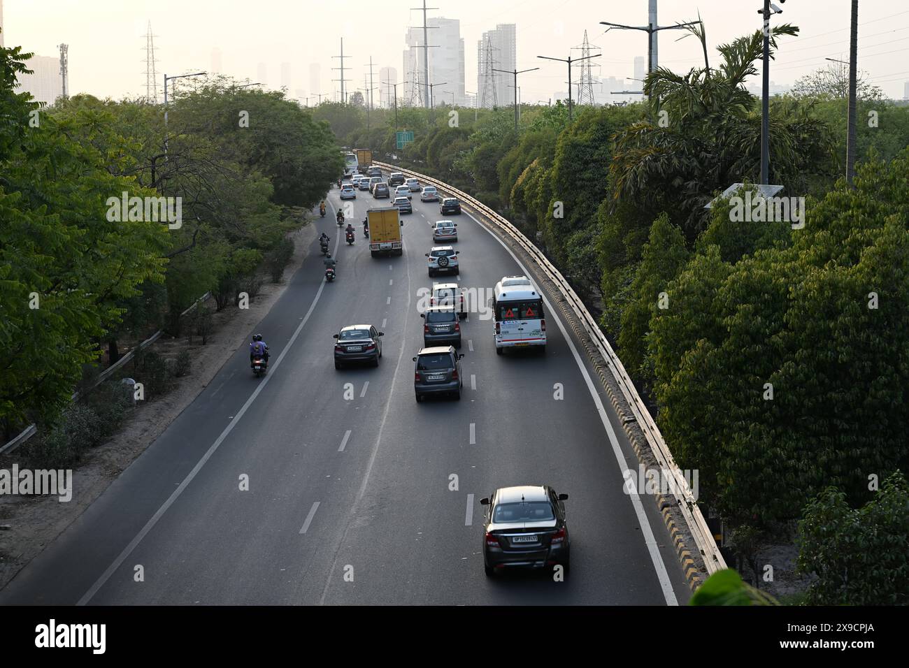 Showcase the six-lane highway stretching into the distance ...