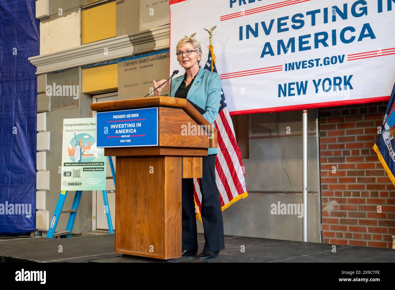 NEW YORK, NEW YORK - MAY 30: U.S. Department of Energy (DOE) Secretary Jennifer Granholm speaks during a clean energy affordability announcement at the Andromeda Community Initiative, Long Island City on May 30, 2024 in the Queens Borough of New York City. Governor Kathy Hochul joined U.S. Department of Energy (DOE) Secretary Granholm, White House Senior Advisor John Podesta and Majority Leader U.S. Senator Chuck Schumer to celebrate New York State becoming the first state in the nation to offer the first phase of Inflation Reduction Act (IRA) Home Electrification and Appliance Rebates (HEAR) Stock Photo