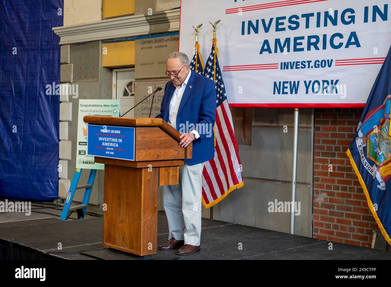 NEW YORK, NEW YORK - MAY 30: Senate Majority Leader, U.S. Senator Chuck Schumer speaks during a clean energy affordability announcement at the Andromeda Community Initiative, Long Island City on May 30, 2024 in the Queens Borough of New York City. Governor Kathy Hochul joined U.S. Department of Energy (DOE) Secretary Granholm, White House Senior Advisor John Podesta and Majority Leader U.S. Senator Chuck Schumer to celebrate New York State becoming the first state in the nation to offer the first phase of Inflation Reduction Act (IRA) Home Electrification and Appliance Rebates (HEAR) Program Stock Photo