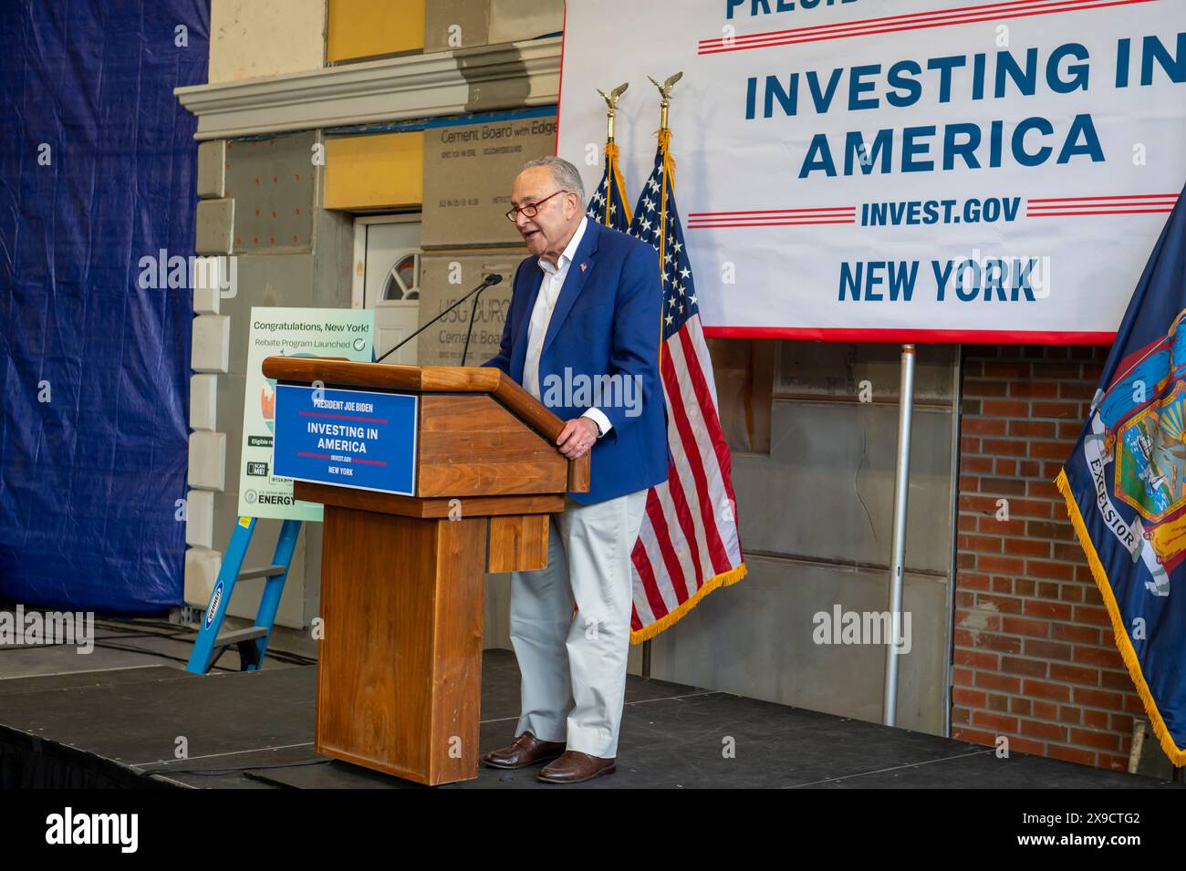 NEW YORK, NEW YORK - MAY 30: Senate Majority Leader, U.S. Senator Chuck Schumer speaks during a clean energy affordability announcement at the Andromeda Community Initiative, Long Island City on May 30, 2024 in the Queens Borough of New York City. Governor Kathy Hochul joined U.S. Department of Energy (DOE) Secretary Granholm, White House Senior Advisor John Podesta and Majority Leader U.S. Senator Chuck Schumer to celebrate New York State becoming the first state in the nation to offer the first phase of Inflation Reduction Act (IRA) Home Electrification and Appliance Rebates (HEAR) Program Stock Photo