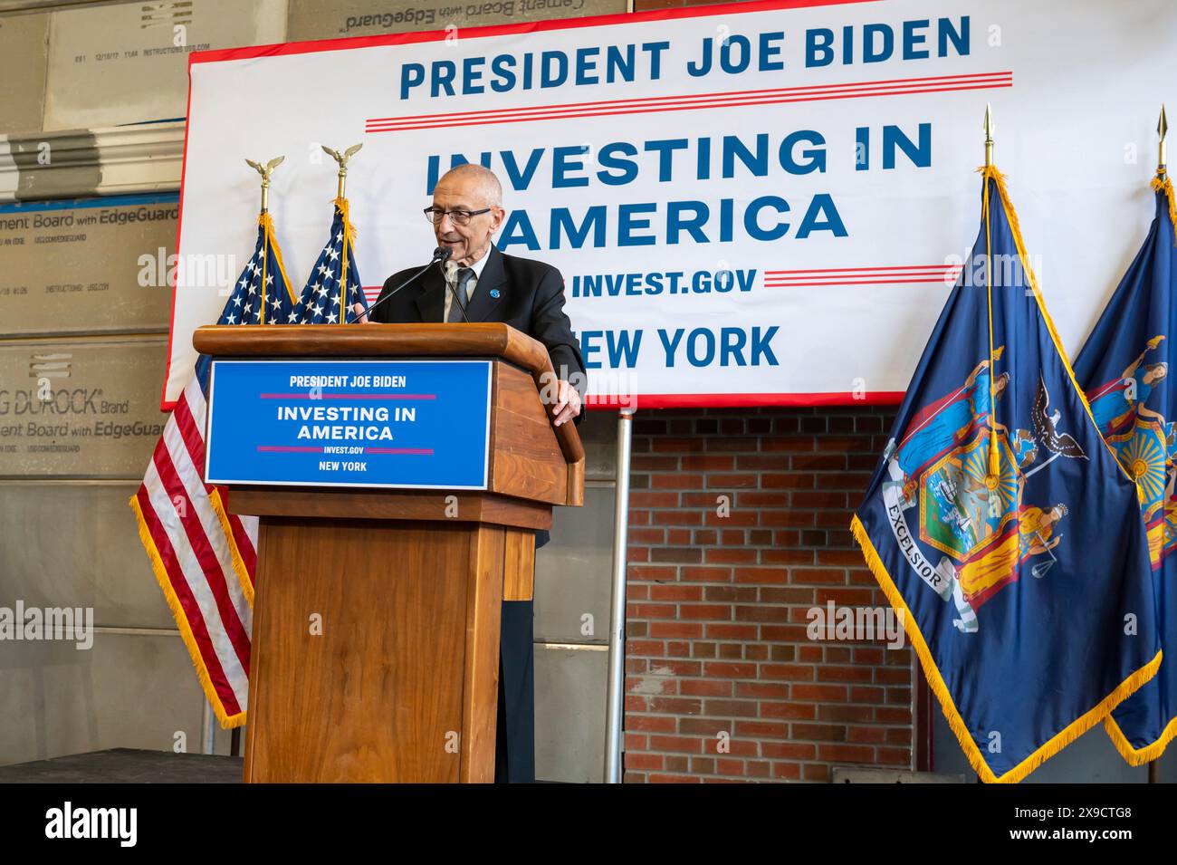 NEW YORK, NEW YORK - MAY 30: White House Senior Advisor John Podesta speaks during a clean energy affordability announcement at the Andromeda Community Initiative, Long Island City on May 30, 2024 in the Queens Borough of New York City. Governor Kathy Hochul joined U.S. Department of Energy (DOE) Secretary Granholm, White House Senior Advisor John Podesta and Majority Leader U.S. Senator Chuck Schumer to celebrate New York State becoming the first state in the nation to offer the first phase of Inflation Reduction Act (IRA) Home Electrification and Appliance Rebates (HEAR) Program funding to Stock Photo