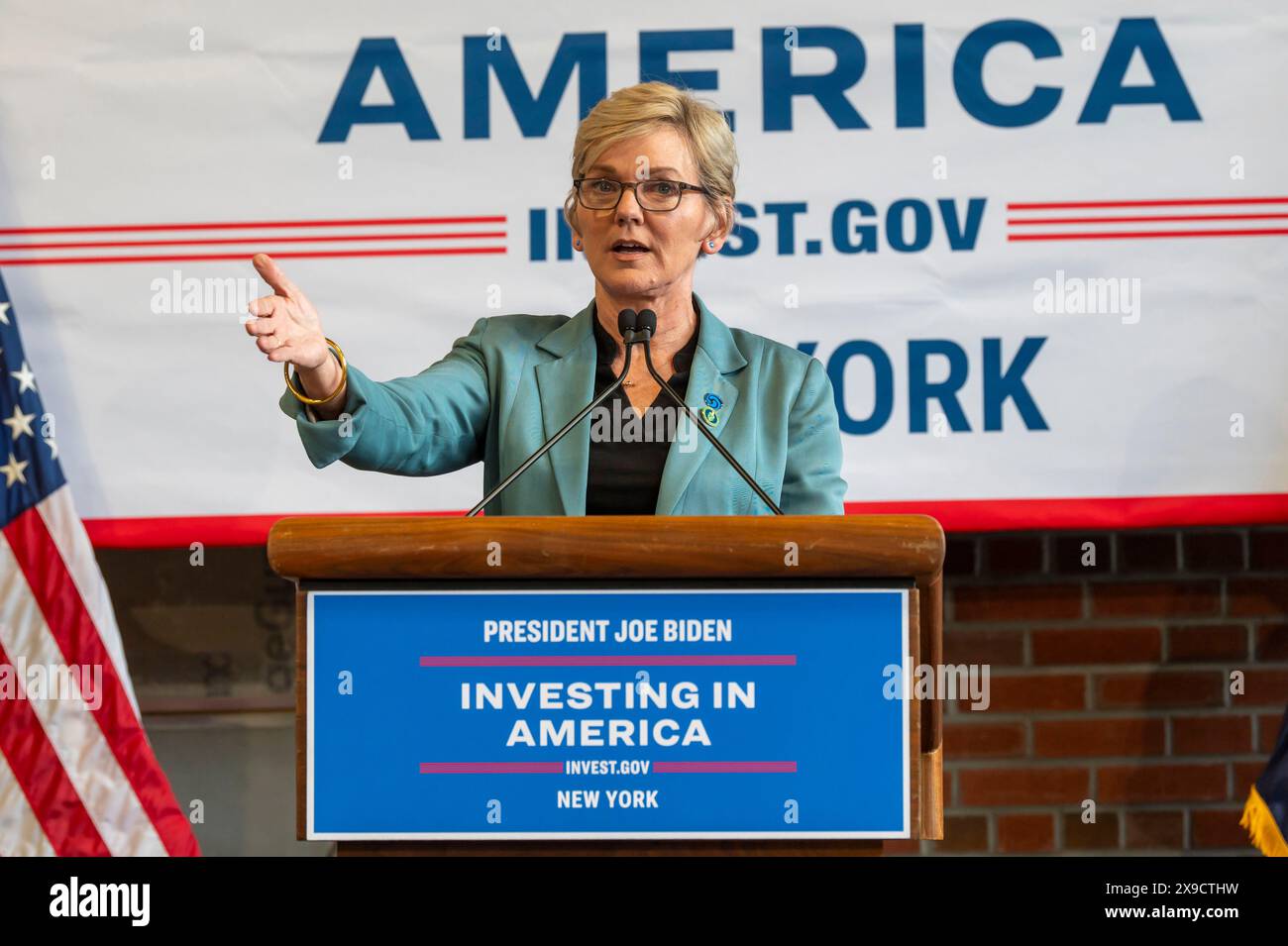 NEW YORK, NEW YORK - MAY 30: U.S. Department of Energy (DOE) Secretary Jennifer Granholm speaks during a clean energy affordability announcement at the Andromeda Community Initiative, Long Island City on May 30, 2024 in the Queens Borough of New York City. Governor Kathy Hochul joined U.S. Department of Energy (DOE) Secretary Granholm, White House Senior Advisor John Podesta and Majority Leader U.S. Senator Chuck Schumer to celebrate New York State becoming the first state in the nation to offer the first phase of Inflation Reduction Act (IRA) Home Electrification and Appliance Rebates (HEAR) Stock Photo