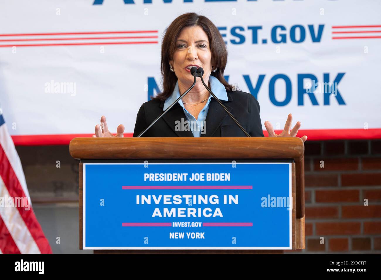 NEW YORK, NEW YORK - MAY 30: New York State Governor Kathy Hochul speaks during a clean energy affordability announcement at the Andromeda Community Initiative, Long Island City on May 30, 2024 in the Queens Borough of New York City. Governor Kathy Hochul joined U.S. Department of Energy (DOE) Secretary Granholm, White House Senior Advisor John Podesta and Majority Leader U.S. Senator Chuck Schumer to celebrate New York State becoming the first state in the nation to offer the first phase of Inflation Reduction Act (IRA) Home Electrification and Appliance Rebates (HEAR) Program funding to con Stock Photo