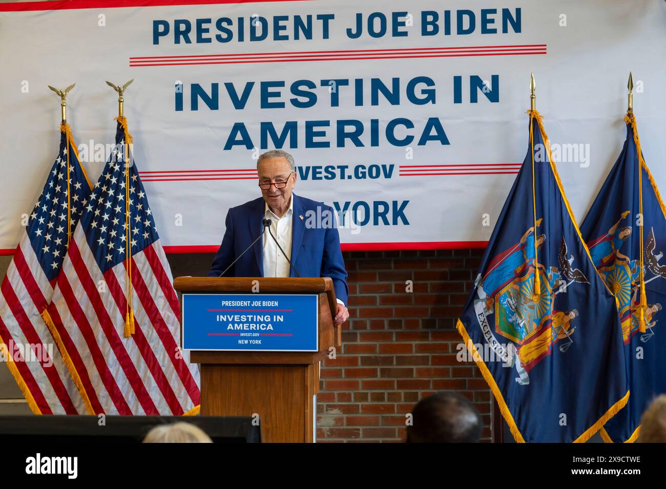 NEW YORK, NEW YORK - MAY 30: Senate Majority Leader, U.S. Senator Chuck Schumer speaks during a clean energy affordability announcement at the Andromeda Community Initiative, Long Island City on May 30, 2024 in the Queens Borough of New York City. Governor Kathy Hochul joined U.S. Department of Energy (DOE) Secretary Granholm, White House Senior Advisor John Podesta and Majority Leader U.S. Senator Chuck Schumer to celebrate New York State becoming the first state in the nation to offer the first phase of Inflation Reduction Act (IRA) Home Electrification and Appliance Rebates (HEAR) Program Stock Photo