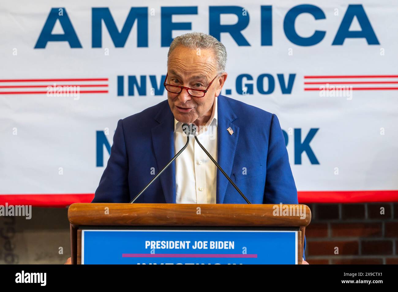 NEW YORK, NEW YORK - MAY 30: Senate Majority Leader, U.S. Senator Chuck Schumer speaks during a clean energy affordability announcement at the Andromeda Community Initiative, Long Island City on May 30, 2024 in the Queens Borough of New York City. Governor Kathy Hochul joined U.S. Department of Energy (DOE) Secretary Granholm, White House Senior Advisor John Podesta and Majority Leader U.S. Senator Chuck Schumer to celebrate New York State becoming the first state in the nation to offer the first phase of Inflation Reduction Act (IRA) Home Electrification and Appliance Rebates (HEAR) Program Stock Photo