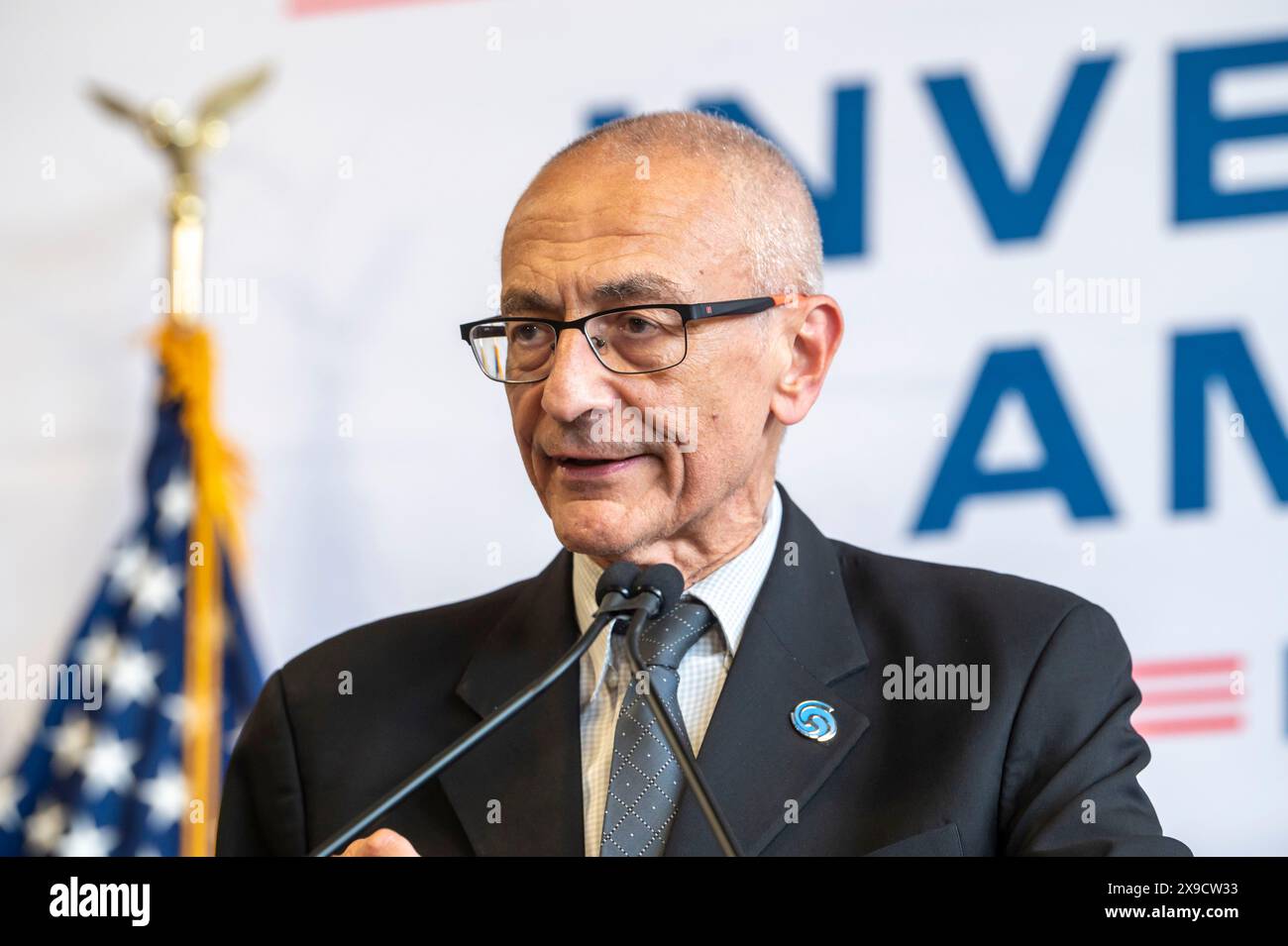 NEW YORK, NEW YORK - MAY 30: White House Senior Advisor John Podesta speaks during a clean energy affordability announcement at the Andromeda Community Initiative, Long Island City on May 30, 2024 in the Queens Borough of New York City. Governor Kathy Hochul joined U.S. Department of Energy (DOE) Secretary Granholm, White House Senior Advisor John Podesta and Majority Leader U.S. Senator Chuck Schumer to celebrate New York State becoming the first state in the nation to offer the first phase of Inflation Reduction Act (IRA) Home Electrification and Appliance Rebates (HEAR) Program funding to Stock Photo