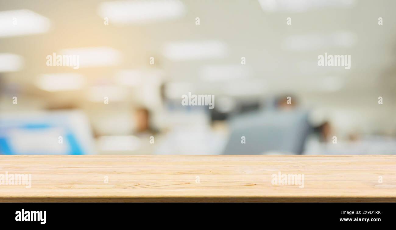 wood table desk with abstract blur office interior business background ...