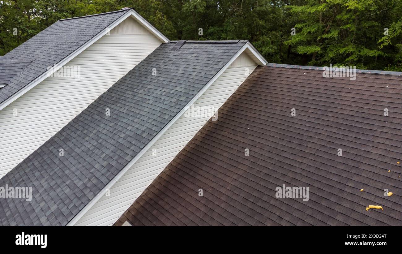 New roof and old roof on house, showing comparison of the two Stock ...