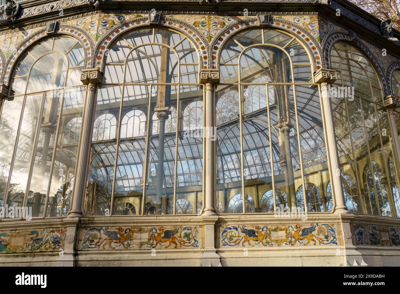 Ornate windows of Palacio de Cristal, The Glass Palace in El Retiro Park, Madrid, Spain Stock Photo