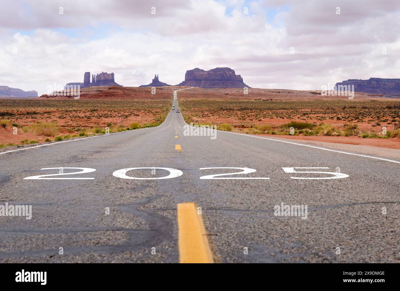 New Year 2025. Text 2025 written on the road to Monument Valley Navajo