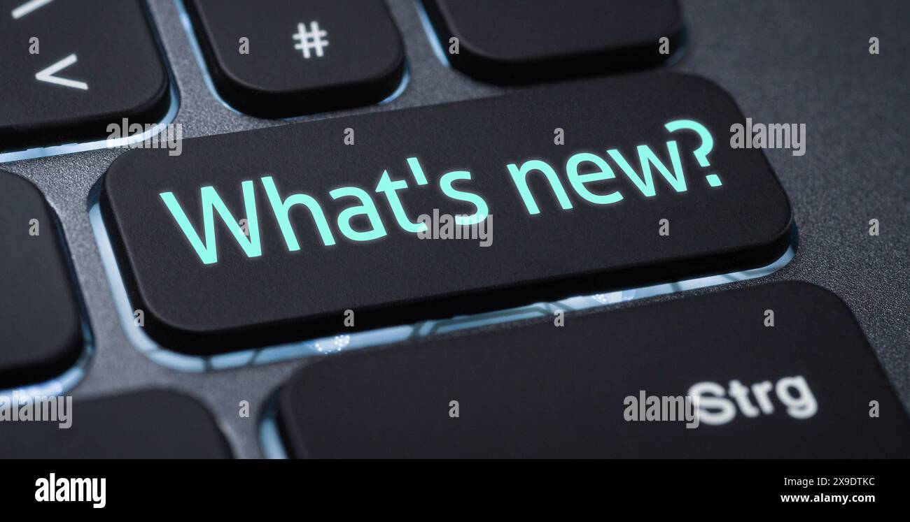 Illuminated keyboard with a labeled key - Whats new Stock Photo