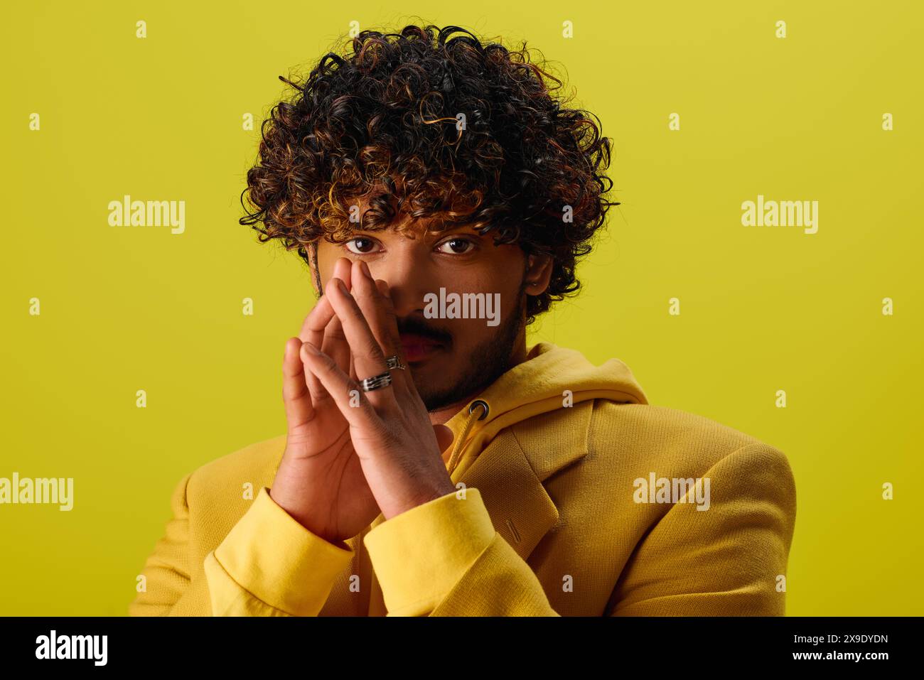 Indian male model with curly hair portrait hi-res stock photography and ...