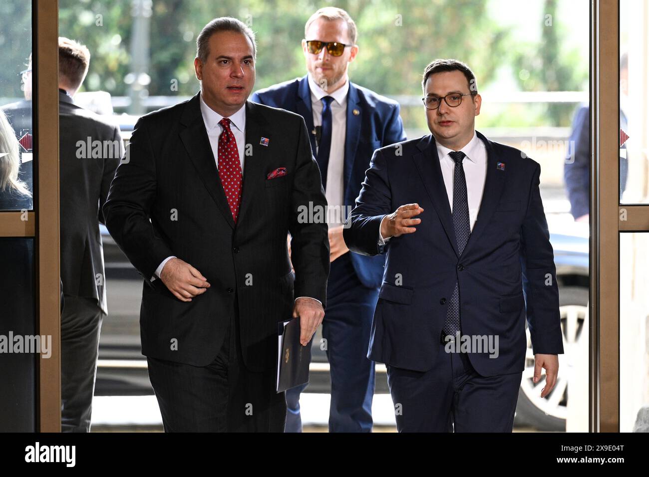 Prague, Czech Republic. 31st May, 2024. Montenegrin Foreign Affairs Minister Filip Ivanovic (left) and his Czech counterpart Jan Lipavsky (right) are seen before the start of the meeting at final day of two-day informal meeting of foreign ministers of NATO countries, to mark 25 years of Czechia in NATO and 75 years from NATO's establishment, in Prague, Czech Republic, on May 31, 2024. Credit: Michal Kamaryt/CTK Photo/Alamy Live News Stock Photo