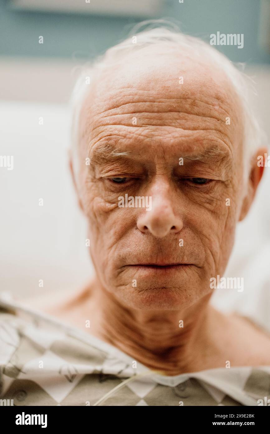 Portrait of elderly male cancer patient in oncology hospital Stock Photo