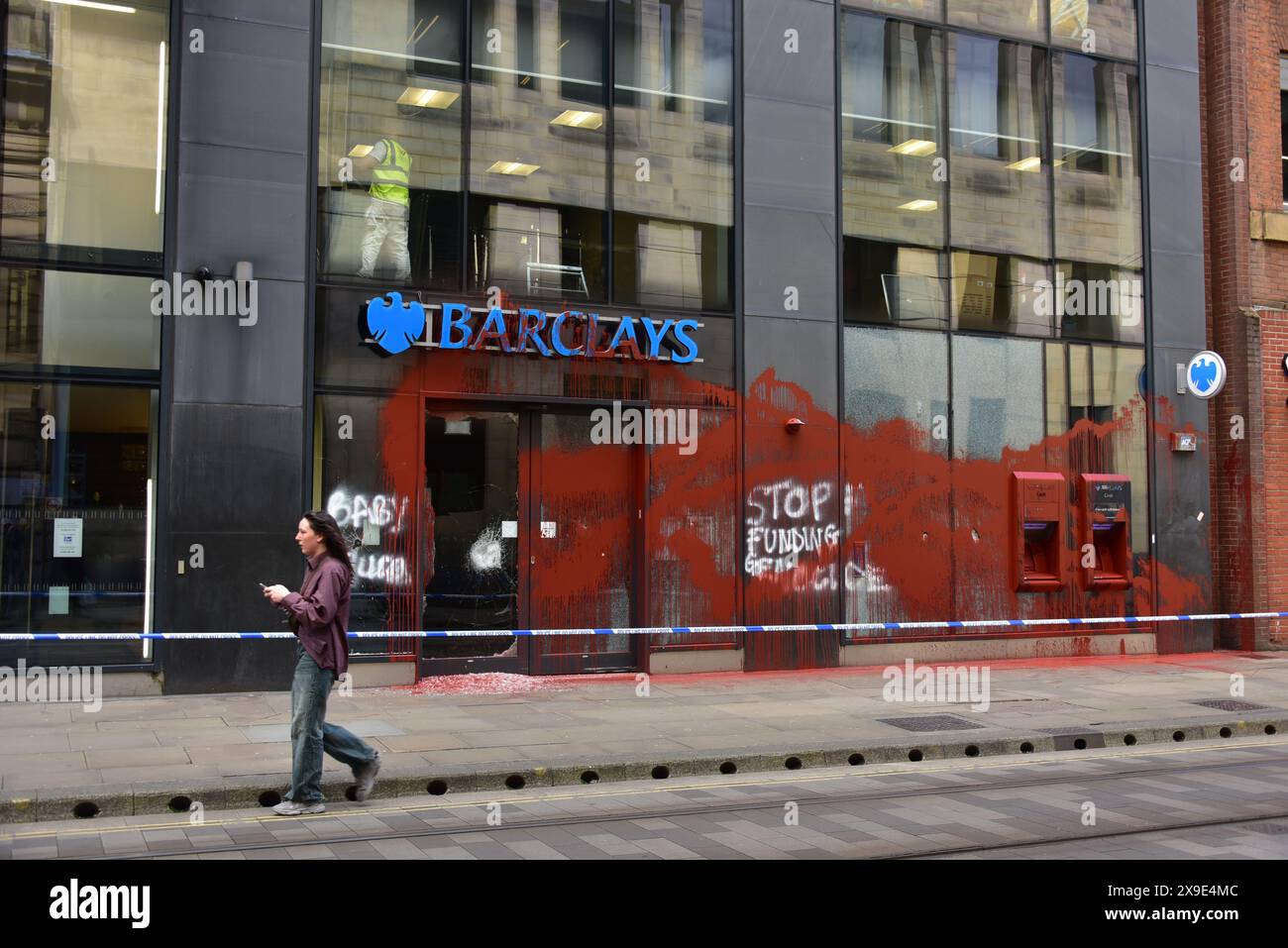 Barclays Bank, Mosley Street, central Manchester, UK, a glass door