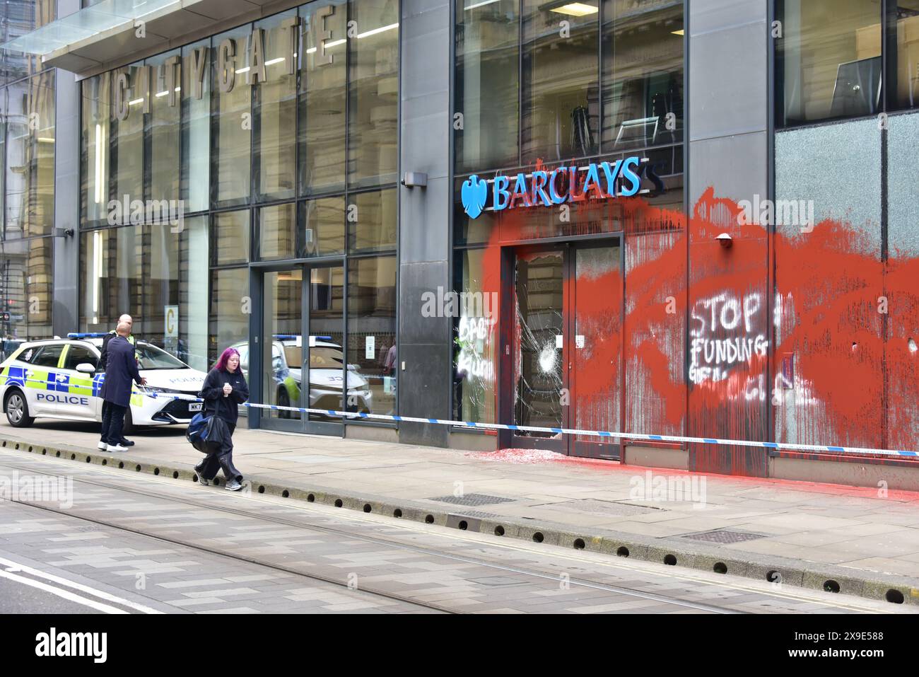 Barclays Bank, Mosley Street, central Manchester, UK, a glass door
