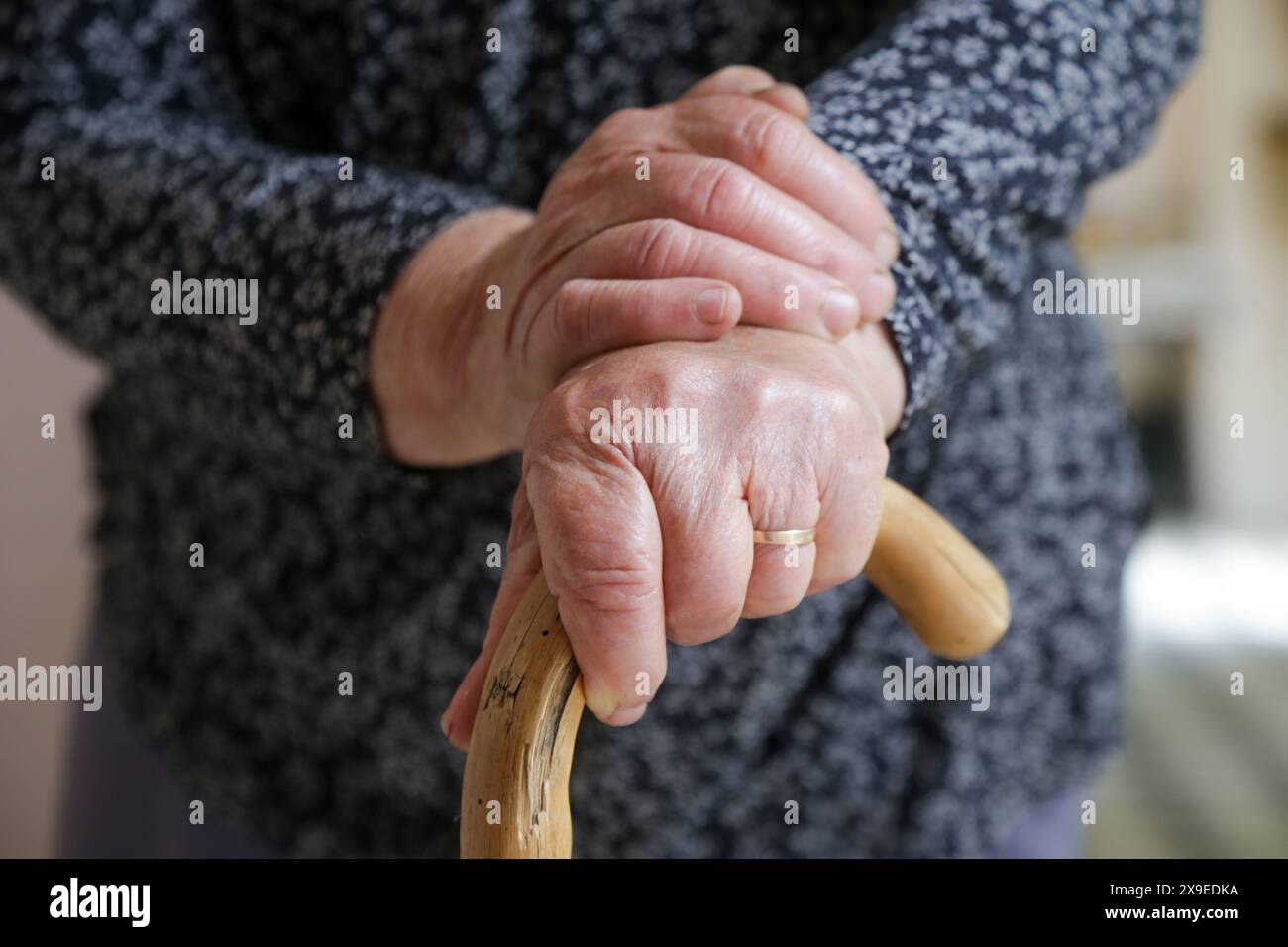 Walking disabilities. Close up of senior disabled woman leaning on her