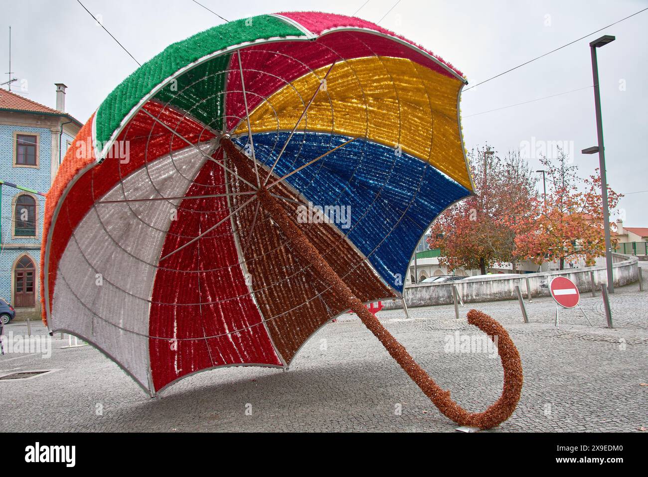 Colorful giant umbrella in the city of Águeda in Portugal; Umbrella Sky