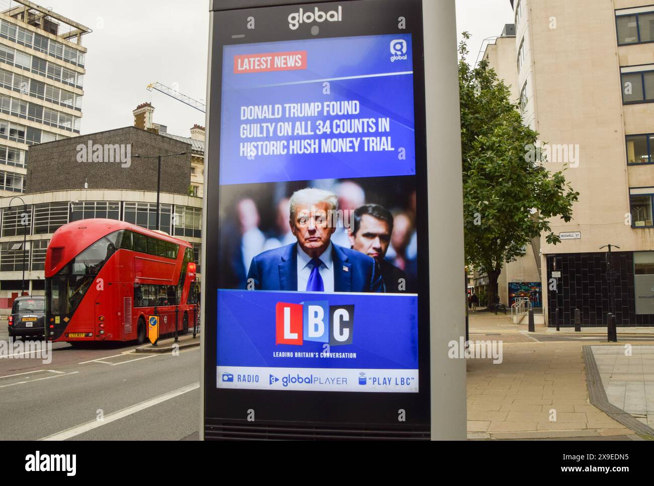 London, UK. 31st May 2024. A screen in Central London displays an LBC news story on the guilty verdict for former president Donald Trump. Trump was found guilty on 34 counts of falsifying business records over a hush-money payment to Stormy Daniels. Credit: Vuk Valcic/Alamy Live News Stock Photo