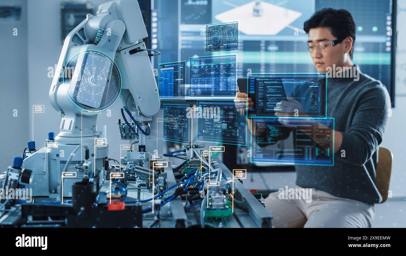 Computer Science Development Engineer Using Tablet Computer to Program and Operate a Robot Arm. VFX Augmented Reality Interfaces and Icons Demonstrate Innovative Industry 4.0 Concept. Stock Photo