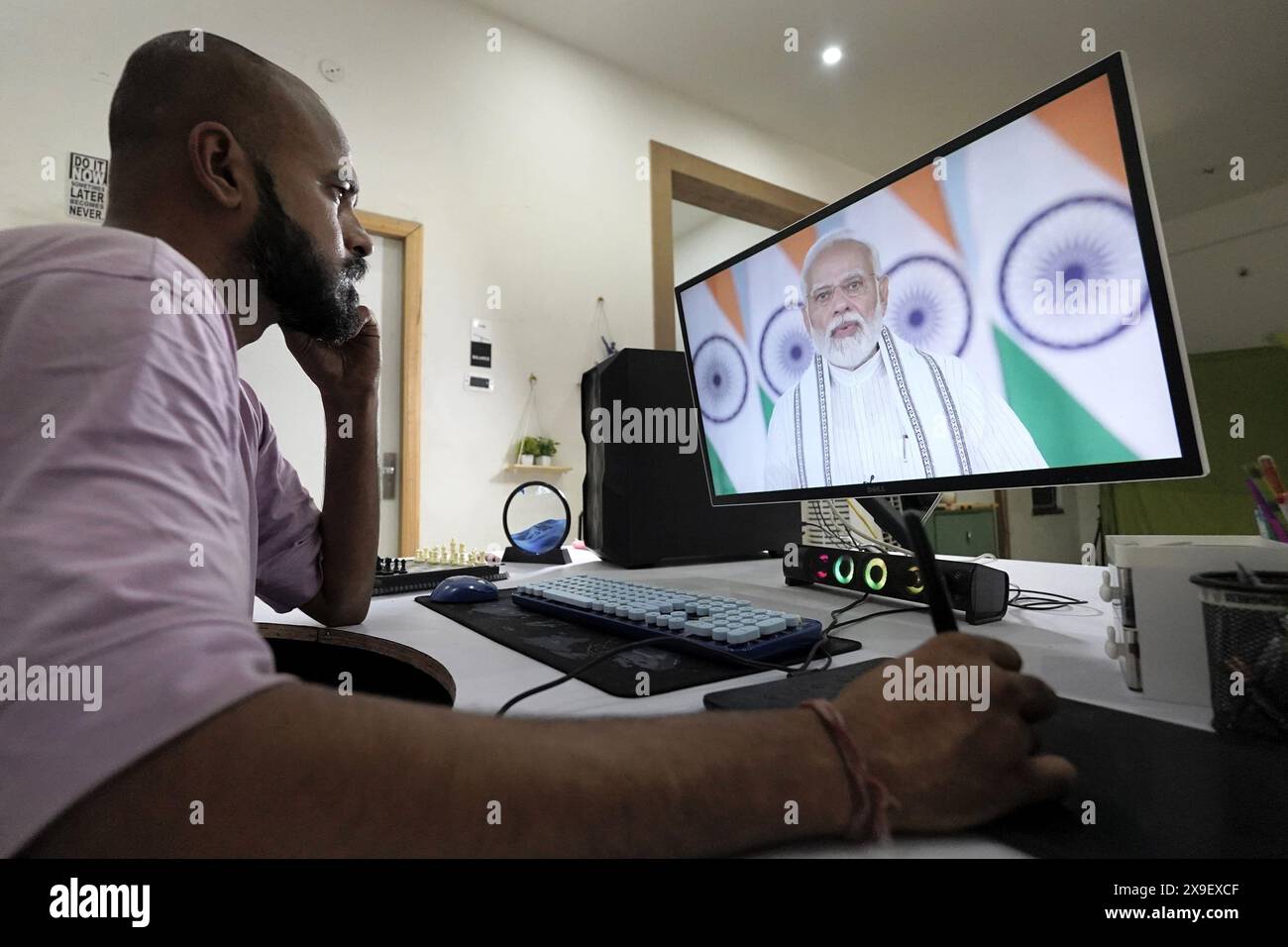 Ajmer, India. 15th May, 2024. Divyendra Singh Jadoun, owner of Polymath Synthetic Media Solutions, shows a demo video to potential customers. Here he lets Indian Prime Minister Modi speak. Among other things, the company creates deepfake videos for election campaigns. Credit: Himanshu Sharma/dpa/Alamy Live News Stock Photo