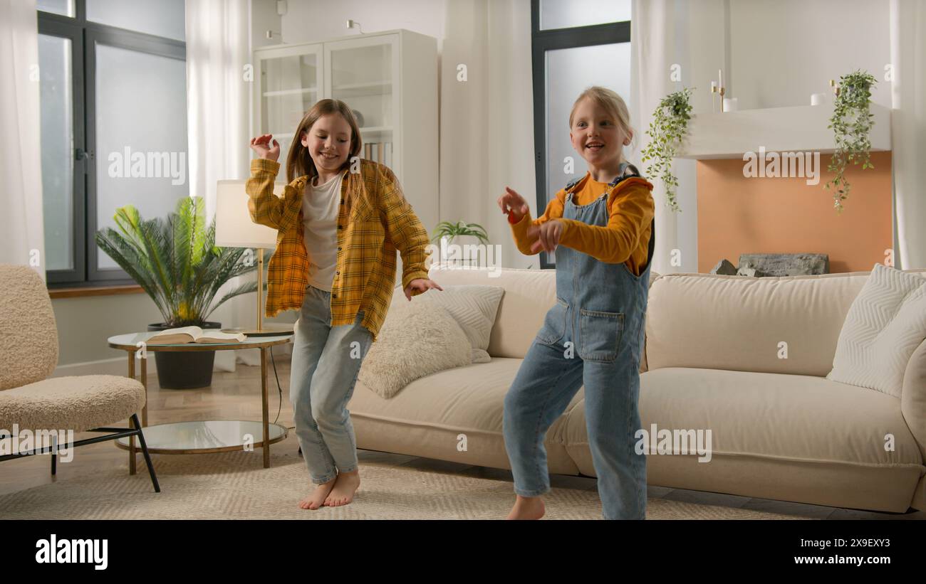 Funny Carefree Little Caucasian Kids Girls Smiling Daughters Siblings