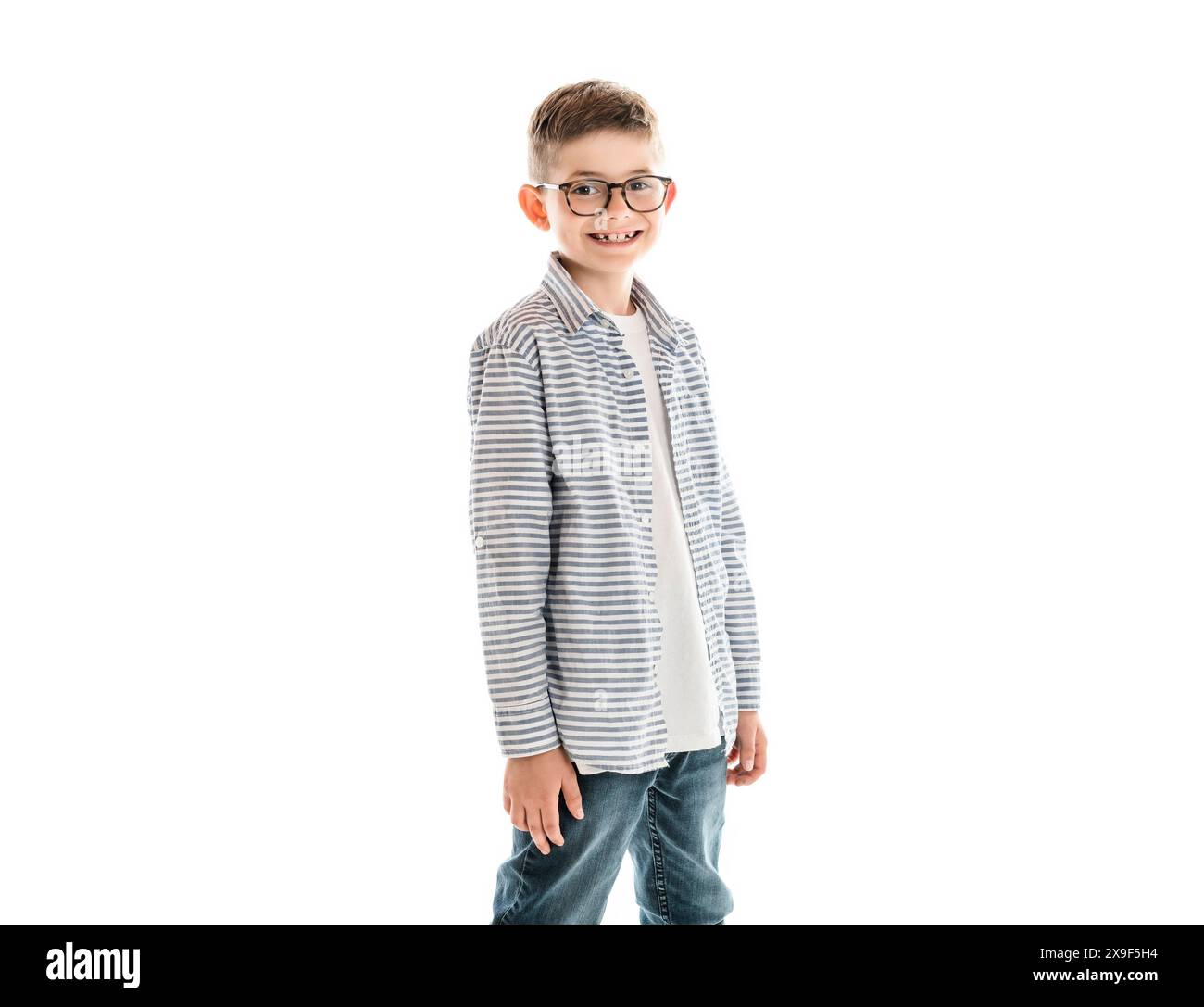 Photo of adorable young happy boy looking at camera Stock Photo - Alamy